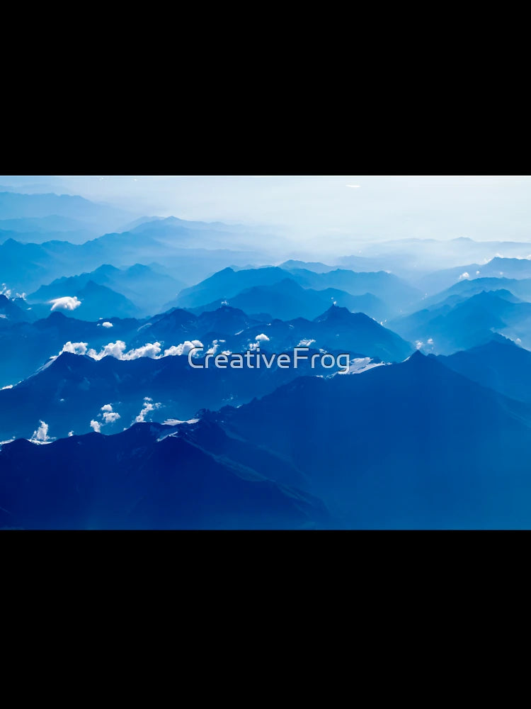 Aerial view of Swiss mountains in blue